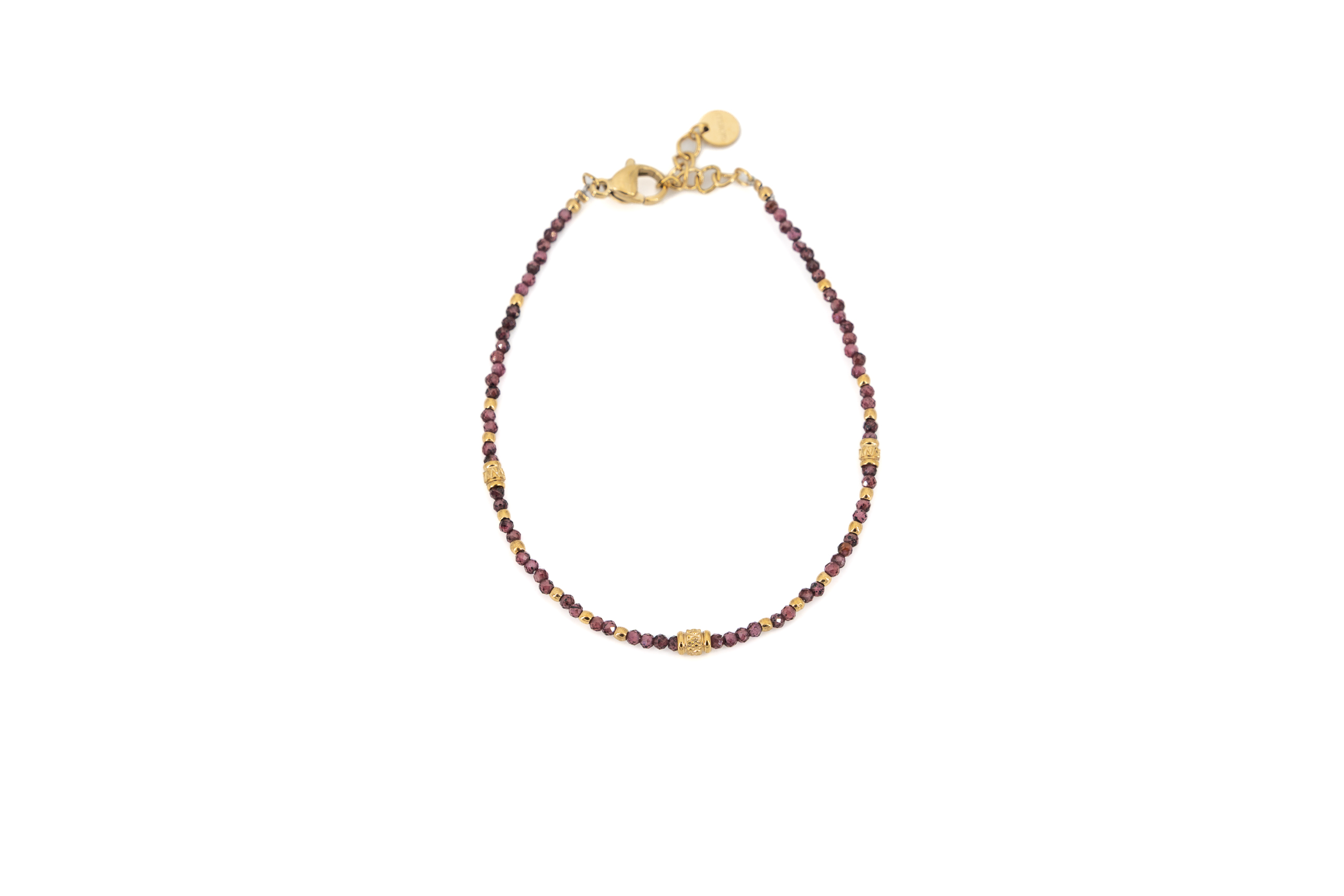 Bracciale acciaio dorato con pietrine viola e tubini